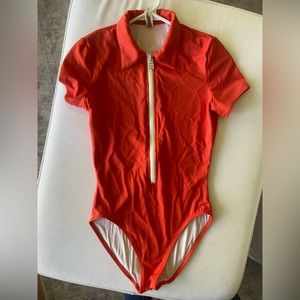 Orange zip up swimsuit
